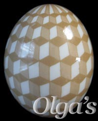 Ukrainian egg. Etched Chicken Pysanka. Geometry in Egg Art. Tumbling blocks.