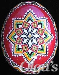 Ukrainian egg. Chicken pysanka with traditional design elements and symbols